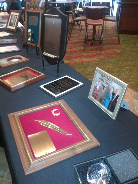 Several of Bill Little's awards were displayed at the reception on Aug. 28. 