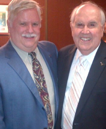 FWAA Executive Director Steve Richardson (left) congratulates Bill Little at the reception.