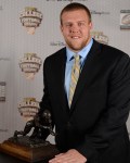 Brandon Scherff of Iowa with his 2014 Outland Trophy.